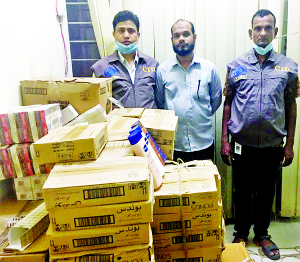 CID police detains a criminal with huge quantity of date expired foreign-made cosmetics conducting raid in the city's Kalyanpur area on Friday.