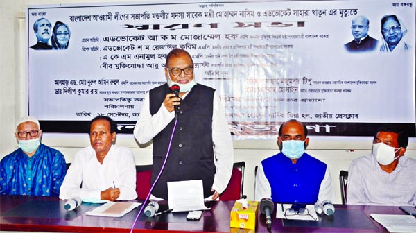 Liberation War Affairs Minister AKM Mozammel Haque speaks at a memorial meeting on presidium members of AL and former ministers Mohammed Nasim and Advocate Sahara Khatun organised by Janatar Protyasha at the Jatiya Press Club on Friday.