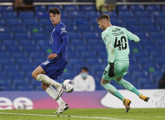 Chelsea's Kai Havertz (left) scores their fifth goal to complete his hat-trick against Barnsley in Stamford Bridge, London on Wednesday.