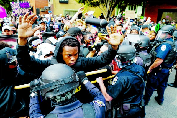 Police and protesters converge during a demonstration in Louisville, Kentucky, , US on Wednesday.