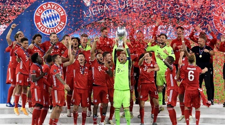 Members of Bayern Munich lift UEFA Super Cup after beating Sevilla at Budapest in Hungary on Thursday.