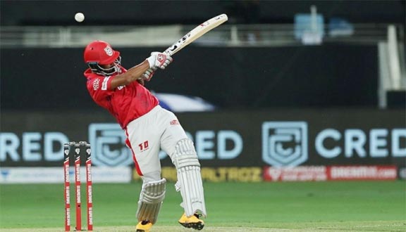 Kings XI Punjab batsman KL Rahul plays a shot during their Indian Premier League match against Royal Challengers Bangalore in Dubai on Thursday.