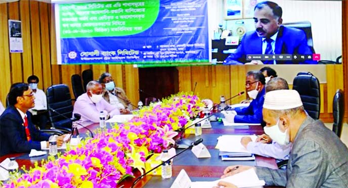 Md. Ataur Rahman Prodhan, CEO and Managing Director of Sonali Bank Limited, presiding over a view exchange meeting with the bank's AD branches managers at its head office in the city on Tuesday. High officials of the bank were also present.