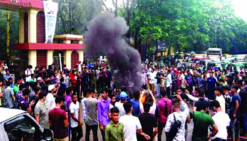 Students stage demonstrations in front of Sylhet MC College on Saturday, protesting the rape of a woman at the dormitory.