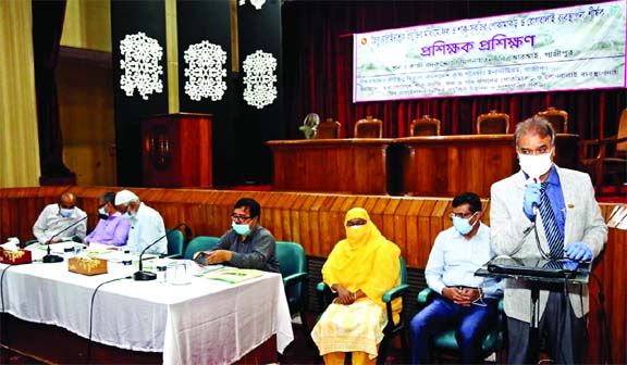 BARI Director General Dr. Md. Nazirul Islam speaks at a workshop on 'Insects and diseases management by using pesticides based technology in fruits and vegetables' at the BARI Kazi Badrudduza Auditorium on Sunday.