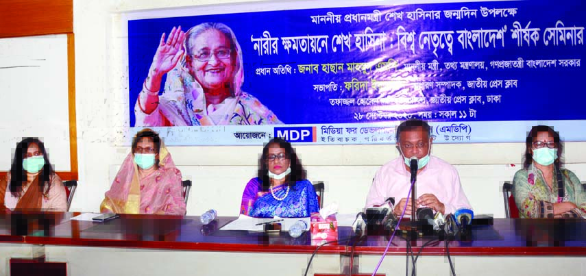 Information Minister Dr. Hasan Mahmud speaks at a seminar on 'Sheikh Hasina in Women Empowerment: Bangladesh in the World Leadership' organised by Media for Development and Peace at the Jatiya Press Club on Monday.