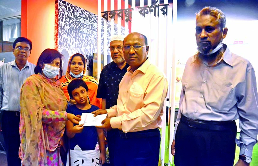 Kazi Alamgir, Managing Director & CEO of Bangladesh Development Bank Limited (BDBL), handing over cheque to a poor talented students marking the birth centenary of Bangabandhu Sheikh Mujibur Rahman and the 74th birthday of the Prime Minister Sheikh Hasina