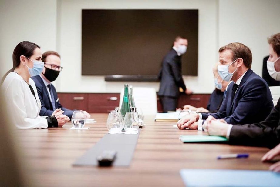 Belarusian opposition leader Sviatlana Tsikhanouskaya meets with French President Emmanuel Macron in Vilnius, Lithuania on Tuesday.