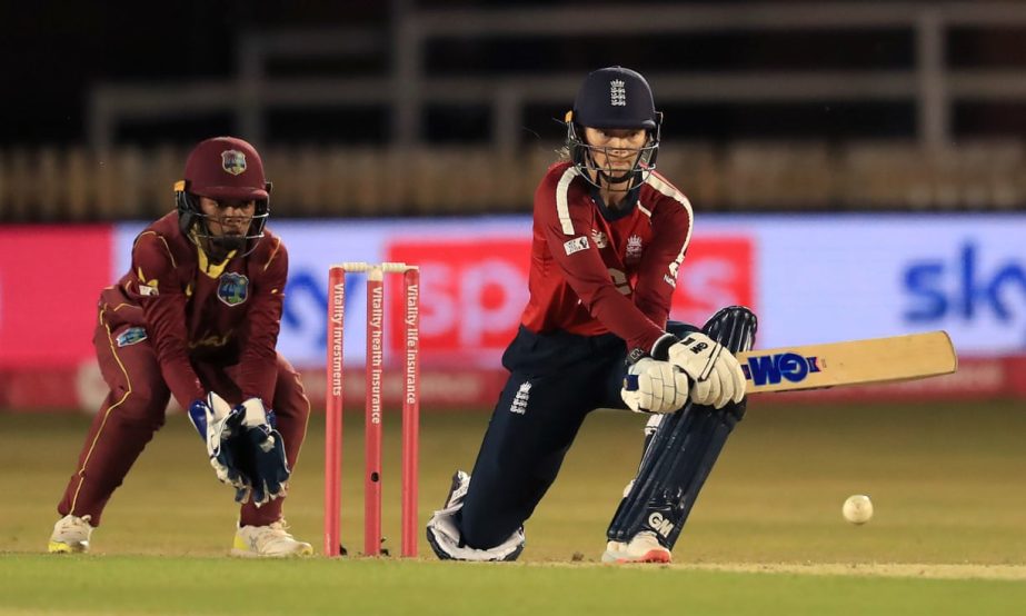 Amy Jones of England Women's Cricket team hits a reverse sweeps on her way to 55 from 37 balls against West Indies Women's Cricket team at Derby on Monday night.