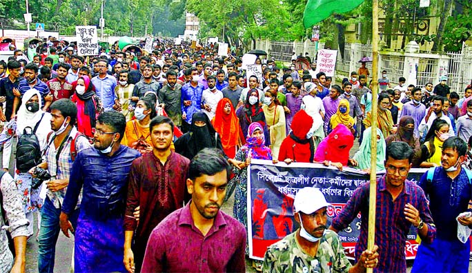 Bangladesh Chhatra Odhikar Parishad stages a demonstration on Dhaka University campus demanding trial of gang-rapes in Sylhet and Khagrachhari on Wednesday.