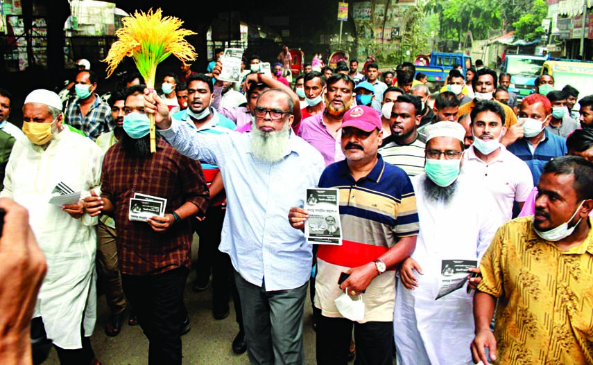 BNP candidate for Dhaka-5 by-election of the Jatiya Sangsad Salauddin Ahmed conducts electioneering at his constituency on Thursday.