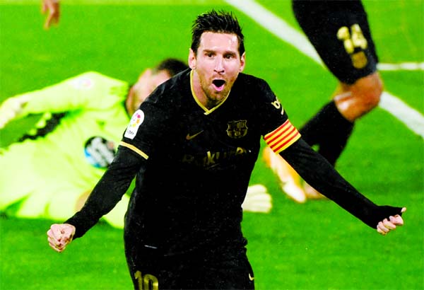 Barcelona's Argentinian forward Lionel Messi celebrates his goal during the Spanish league football match between RC Celta de Vigo and FC Barcelona at the Balaidos stadium in Vigo on Thursday.