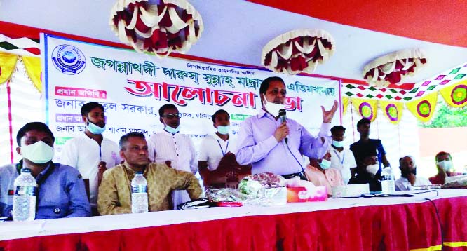 Faridpur DC Atul Sarkar speaks at a discussion held at the Jagannathdi Darus Sunnah Madrasa and Orphanage premises in Saltha Upazila of the district on Tuesday. BFUJ Secretary General Saban Mahmud also attended the discussion.