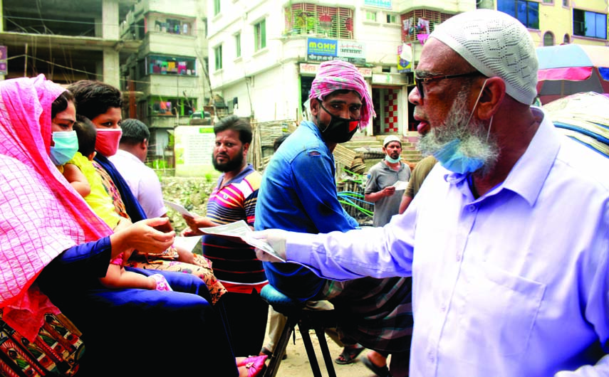 BNP candidate for Dhaka-5 by-election of the Jatiya Sangsad Salahuddin Ahmed conducts electioneering at Sarulia area on Saturday.