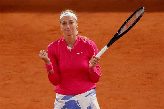 Petra Kvitova celebrates winning her fourth-round match against China's Zhang Shuai at the French Open in Paris on Monday.