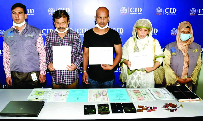 CID police detains three members of forged certificate making gang for various educational institutions including Dhaka University conducting raids at different parts of the city. The snap was taken from CID office on Monday.