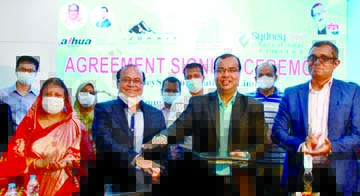 Abu Reza Khan, Managing Director of Summit Technopolis and Sagor Kumar Tito, Managing Director of SydneySun International, exchanging an agreement signing document setting nation's first video surveillance manufacturing plant at Summit Technopolis in Kal