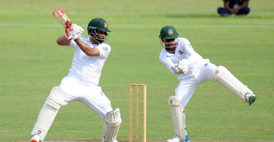 Tamim Iqbal of Ryan Cook XI hits a shot during the Intra-Squad warm-up match between Ryan Cook XI and Ottis Gibson XI at the Sher-e-Bangla National Cricket Stadium in the city's Mirpur on Tuesday.