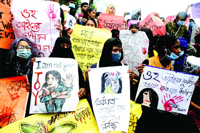 Students take to the road in Bogura on Wednesday protesting rape incidents across the country.
