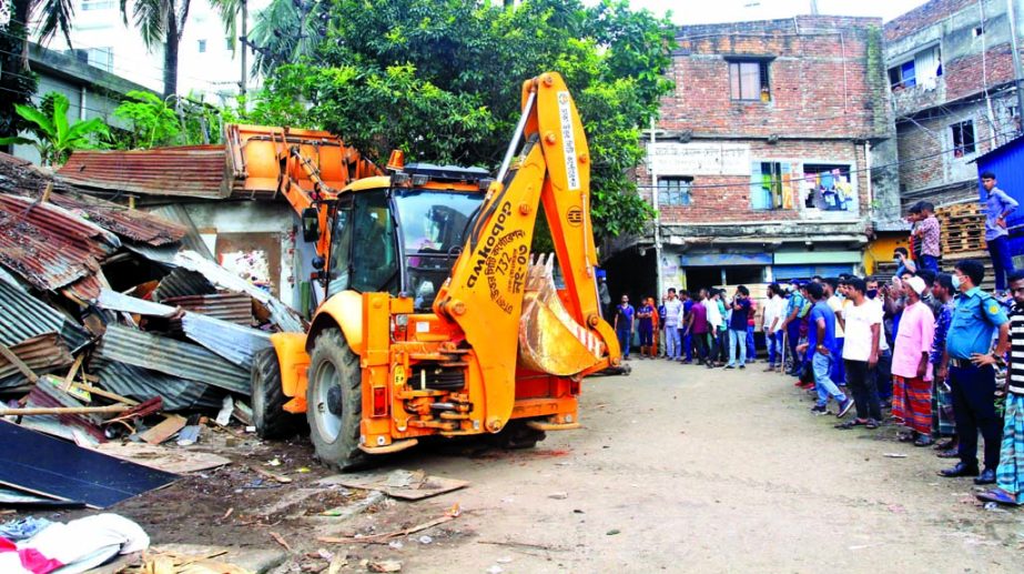 Dhaka North City Corporation evicts illegal establishments from the capital's Tejgaon on Wednesday.