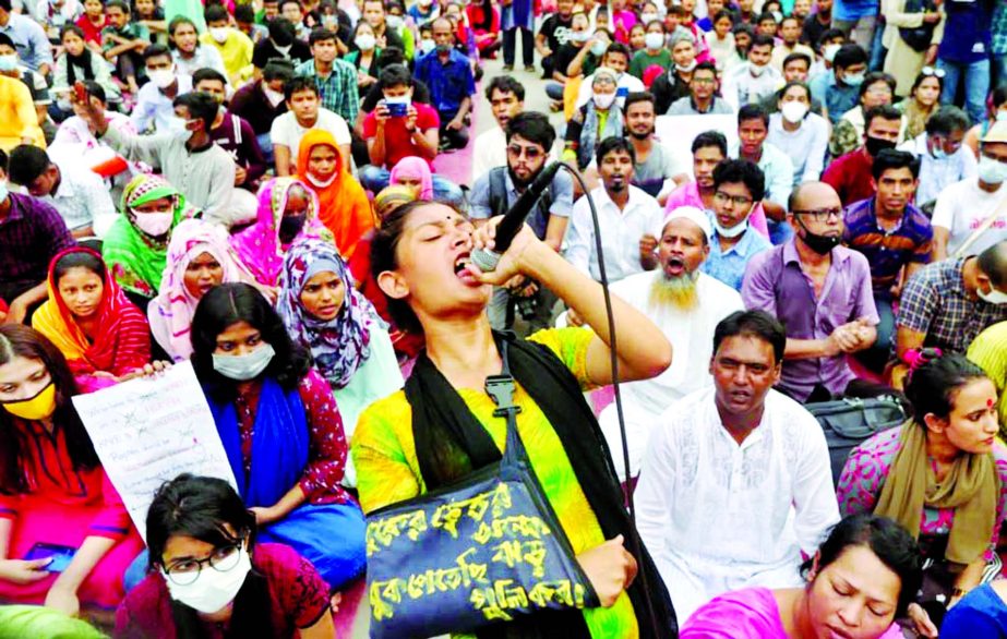 A protester chants slogans during an-anti rape protest under the banner "Bangladesh Against Rapes"" in the capital's Shahbagh intersection on Friday."