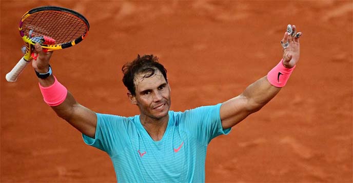 Spain's Rafael Nadal celebrates after winning against Argentina's Diego Schwartzman during their men's singles semi-final tennis match of French Open tennis tournament in Paris on Friday.