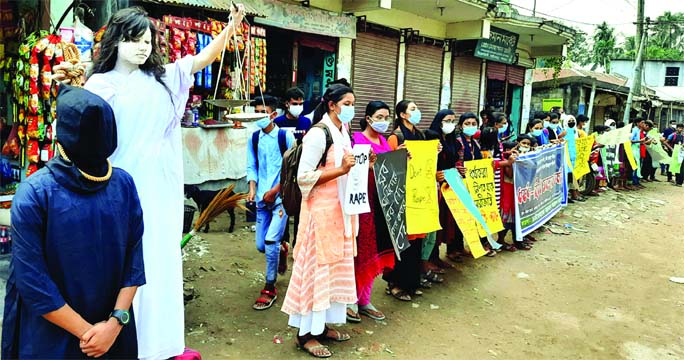 People from a human chain at the Zero Point in Chatmohar of Pabna district on Sunday protesting rape incident across the country.