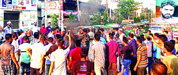 Local people block the Sylhet-Sunamganj road at Akhalia area in Sylhet city on Sunday ptotesting death of a youth in police custody. Victim in the inset.