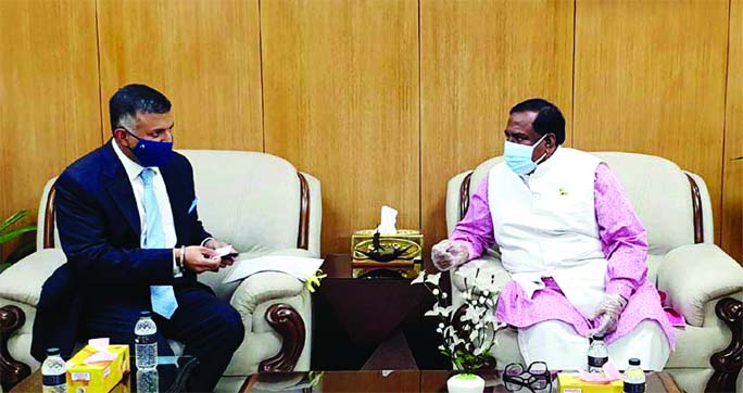 Newly appointed Indian High Commissioner to Bangladesh Vikram Kumar Doraiswami calls on Food Minister Sadhan Chandra Majumder at the latter's office of the ministry on Monday.