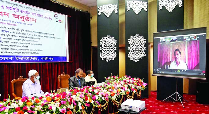 Agriculture Minister Dr. Muhammad Abdur Razzaque, MP, speaks at the inaugural session of 'Central Research Review and Planning Workshop-2020' as chief guest through Zoom Platform held in Kazi Badrudduza auditorium of the institute on Wednesday. BARI Dir