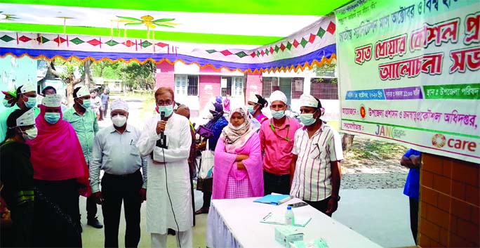 Gangachara upazila (in Rangpur) Chairman Ruhul Amin speaks at a discussion held at the Upazila premises on Thursday marking the Global Handwashing Day 2020.