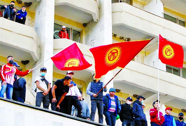 Supporters of Kyrgyzstan's Prime Minister Sadyr Japarov attend a rally in Bishkek, Kyrgyzstan on Thursday.