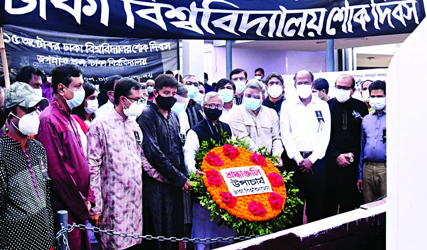 Vice-Chancellor of Dhaka University Prof. Dr. Md.. Akhtaruzzaman pays floral tributes at Jagannath Hall Memorial Plaque of the university on Thursday marking DU Mourning Day.
