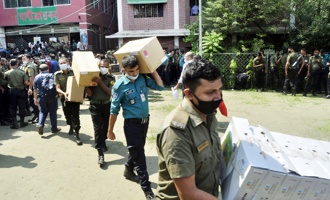 Election materials being brought to different polling centers for Dhaka-5 by-election. The snap was taken from the city's Dania University and College on Friday.