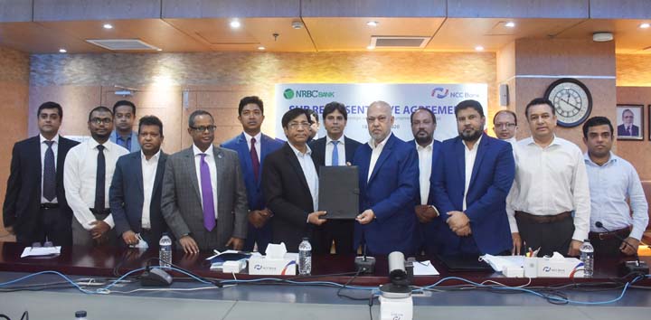 Khondoker Nayeemul Kabir, Managing Director (CC) of NCC Bank Limited and Md. Mukhter Hossain, Managing Director and CEO of NRBC Bank Limited, exchanging agreement signing document at NRBC Bank head office on Sunday. Under the deal, NRBC Bank will be able