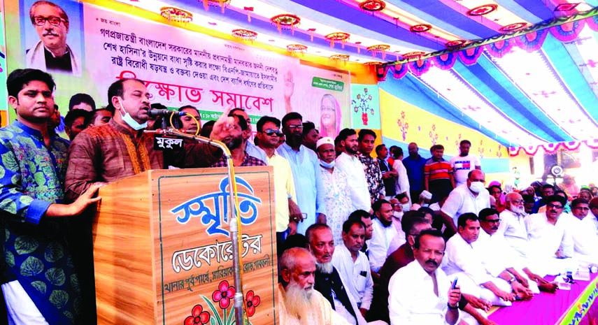 Bogura Municipal Awami League President and Gabtoli Upazila Chairman Rafi Newaz Khan Robin speaks at an anti-rape rally at Gabtoli Pilot High School field on Sunday.