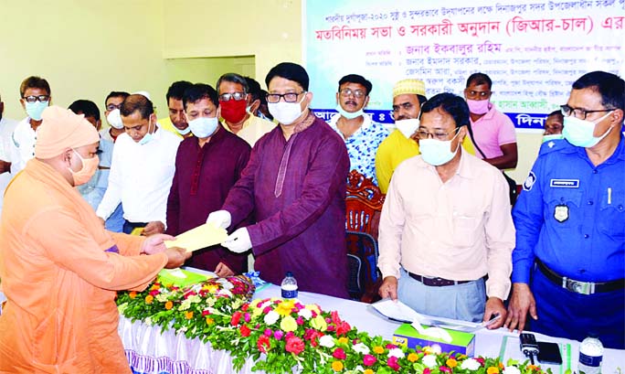 Whip Iqbalur Rahim, MP, speaks at a view-exchange meeting with the leaders of Puja Committees in the hall room of Dinajpur Sadar Upazila Parishad on Thursday.