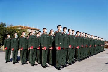 Soldiers stand in formation in front of the Great Hall of the People ahead of an event to mark the 70th anniversary of China entering the Korean War at the Great Hall of the People in Beijing.