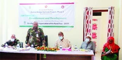 Brigadier General Md Mahbubul Islam, (PBRLP, CSC-Pahse-2, PM-3), speaks at the inaugural ceremony of staff training on Resettlement and 'Development of Padma Bridge Rail Link Project-Phase-2' at the Development Organization of Rural Poor (DORP) area off