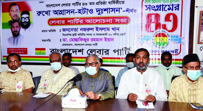 BNP Standing Committee Member Nazrul Islam Khan speaks at a discussion marking the 43rd Founding Anniversary of Bangladesh Labour Party at the Jatiya Press Club on Saturday.