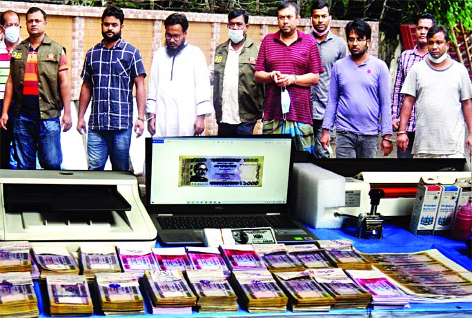 In separate drives, DB police arrest 6 persons along with counterfeit money worth Tk. 58 lakh and devices from Kotwali, Adabar and other parts in the capital on Saturday.