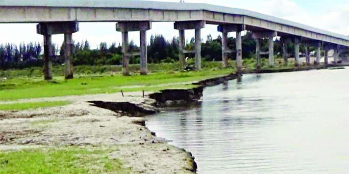 The mindless sand lifting from a sand quarry in Sonagazi of Feni district poses threat to the bridge over Chhoto Feni River.