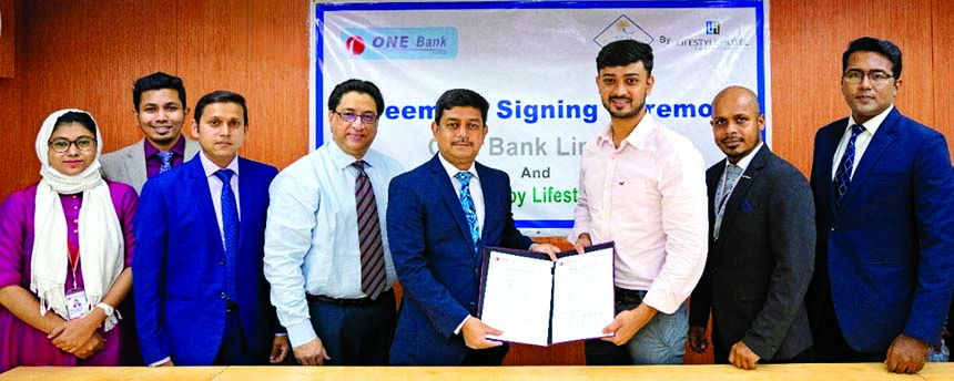 Md. Kamruzzaman, Head of Retail Banking of ONE Bank Limited (OBL) and Shahed Azaz Ahmed, Managing Director of Hotel Tropical Daisy, exchanging agreement signing documents at the banks head office in the city recently. Under the deal, OBL Credit, Debit and