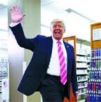 President Donald Trump waves after voting in the 2020 Presidential Election at the Palm Beach County Library in West Palm Beach, Florida.