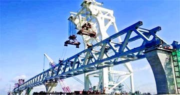 The world's largest floating crane, Tian-e, installs the 34th span of the Padma Bridge at the Mawa point in Louhajang Upazila of Munshiganj on Sunday, making 5,100 metres of the giant structure visible.