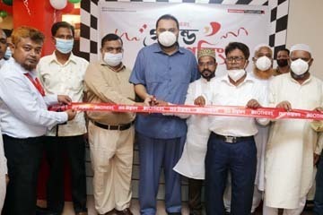 Sharifuzzaman Sarkar, Director of Brothers Furniture Limited, inaugurating its new showroom at Rajbari recently. Alim Ur Reza, Assistant Manager (Marketing and Sales) and other officials of the company and local dignitaries were present.