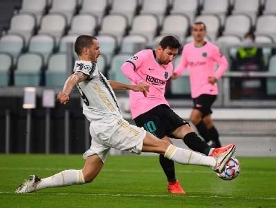 Barcelona's Argentine forward Lionel Messi shoots to goal during the UEFA Champions League Group G football match against Juventus at the Juventus stadium in Turin on Wednesday.