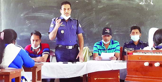 Banaripara Police Station OC Md Helal Uddin speaks at an event organized on the occasion of the Community Policing Day in Banaripara of Barishal district on Wednesday.