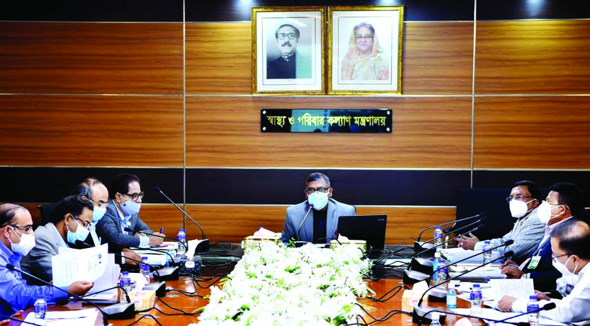 Health and Family Welfare Minister Zahid Maleque presides over a preparatory meeting on resisting second wave of corona at the seminar room of the ministry on Tuesday.