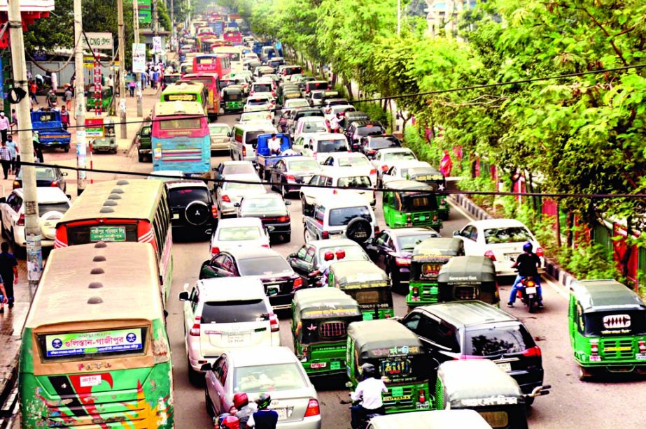 The city dwellers on Tuesday experience huge traffic gridlocks on different roads from morning to late evening due to street programmes of various organisations for realising their demands. This photo was taken from Saatrasta crossing at Tejgaon in the no
